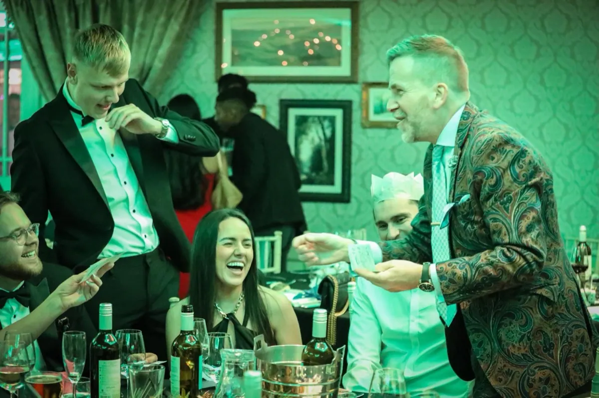 Martin Sanderson performing corporate close-up magic for guests in London
